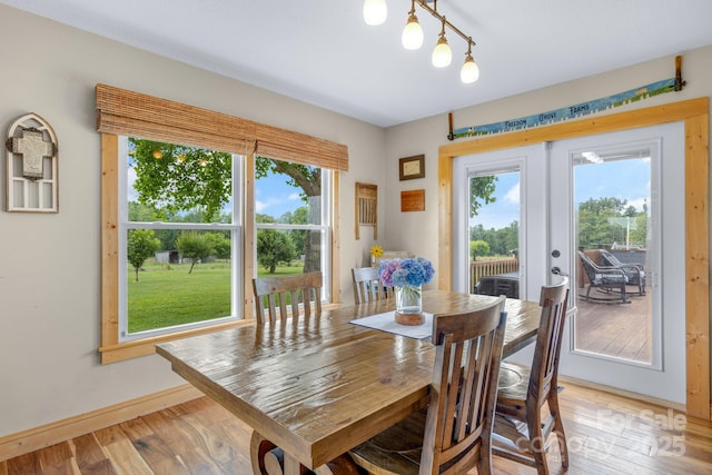 333 Lambs Grill Rd, Rutherfordton, NC 28139 - dining space featuring french doors, light wood-style floors, and baseboards