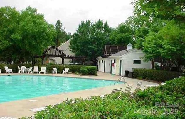 4492 Antelope Ln, Charlotte, NC 28269 - community pool featuring a gazebo and a patio area