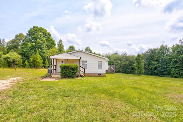 4630 Irish Potato Rd, Kannapolis, NC 28083 - back of property with crawl space and a lawn