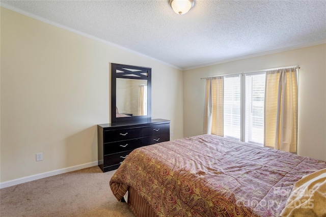 4630 Irish Potato Rd, Kannapolis, NC 28083 - bedroom featuring ornamental molding, light colored carpet, lofted ceiling, a textured ceiling, and baseboards