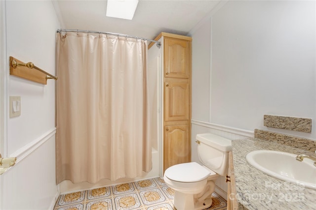 4630 Irish Potato Rd, Kannapolis, NC 28083 - full bathroom featuring shower / bath combo with shower curtain, toilet, and vanity