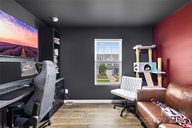 2717 Aubrey St, Monroe, NC 28110 - home office featuring wood finished floors and baseboards