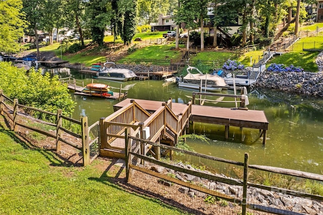 315 Wood Duck Loop, Mooresville, NC 28117 - dock area featuring stairway, a water view, and view of wooded area