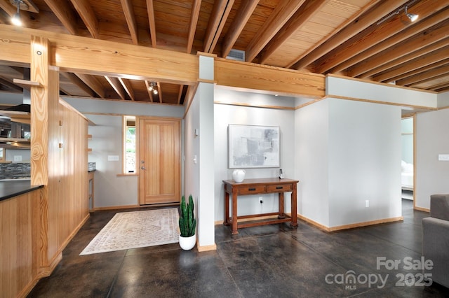 588 Long Branch Rd, Swannanoa, NC 28778 - foyer entrance featuring baseboards and wooden ceiling with exposed beams