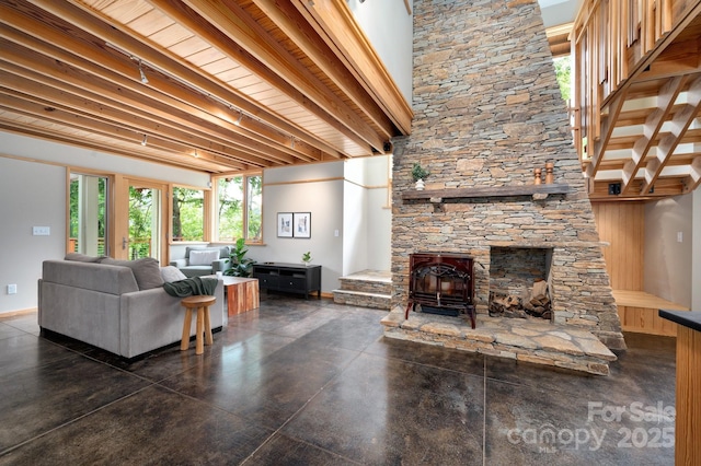 588 Long Branch Rd, Swannanoa, NC 28778 - living room with a wood stove and concrete flooring