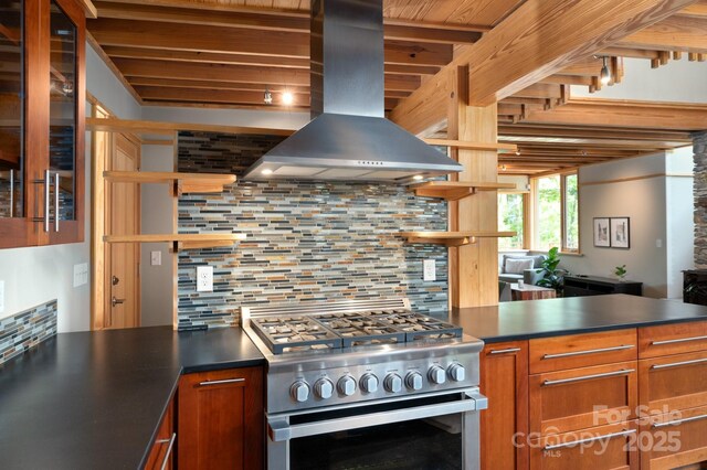 588 Long Branch Rd, Swannanoa, NC 28778 - kitchen with high end range, island range hood, tasteful backsplash, dark countertops, and beam ceiling