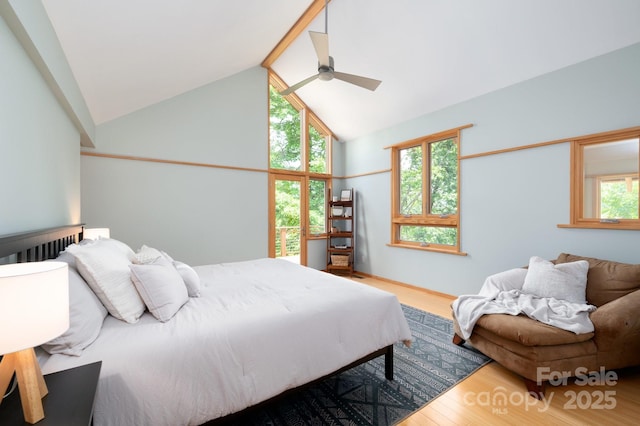 588 Long Branch Rd, Swannanoa, NC 28778 - bedroom with high vaulted ceiling, wood finished floors, and ceiling fan