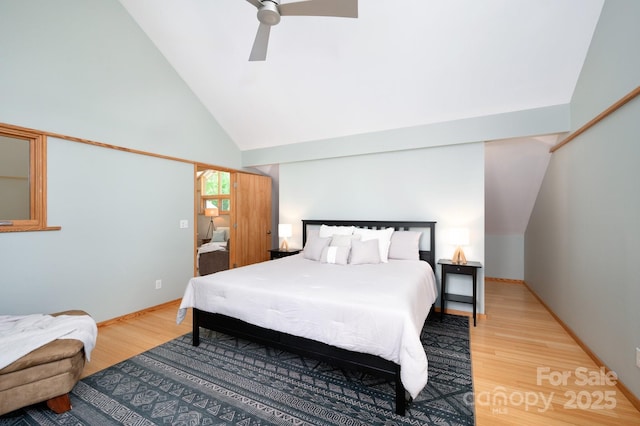 588 Long Branch Rd, Swannanoa, NC 28778 - bedroom featuring light wood-style floors, high vaulted ceiling, ceiling fan, and baseboards