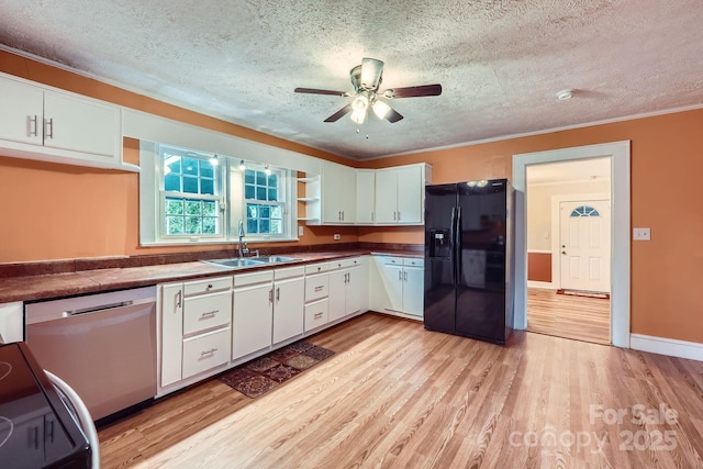 8255 Castor Rd, Salisbury, NC 28146 - kitchen featuring black fridge with ice dispenser, a sink, a textured ceiling, dishwashing machine, and ceiling fan