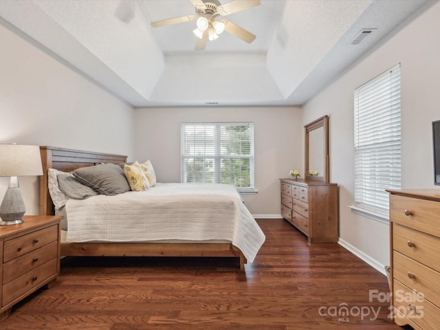 116 Birchwood Ct, Mount Holly, NC 28120 - bedroom featuring a raised ceiling, dark wood-style flooring, and ceiling fan