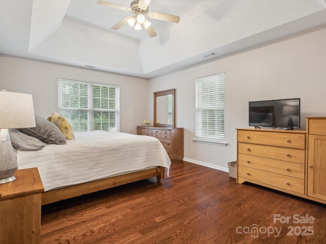 116 Birchwood Ct, Mount Holly, NC 28120 - bedroom featuring a raised ceiling, dark wood-style floors, and ceiling fan