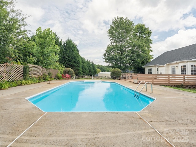 116 Birchwood Ct, Mount Holly, NC 28120 - view of swimming pool featuring a deck and a patio area