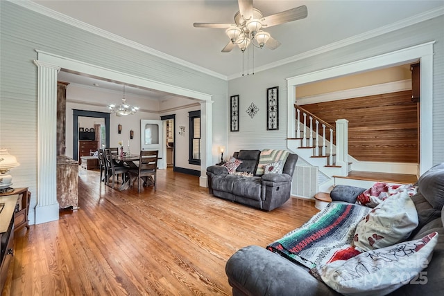 200 W 14th St, Salisbury, NC 28144 - living room featuring light wood-type flooring, a chandelier, stairway, ceiling fan, and ornamental molding