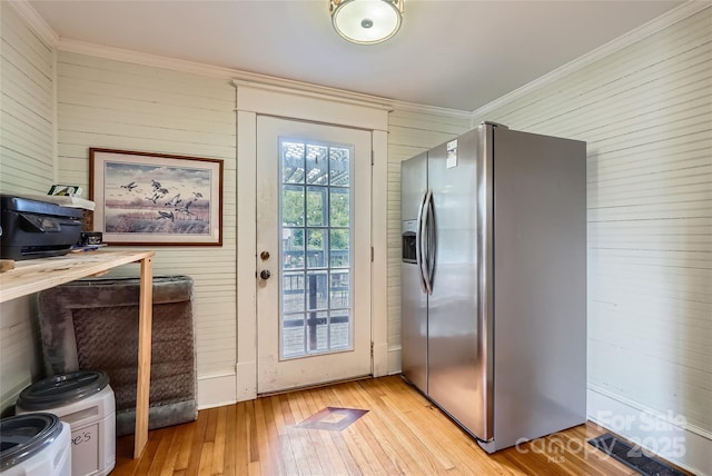 200 W 14th St, Salisbury, NC 28144 - doorway featuring wooden walls, ornamental molding, and light wood finished floors