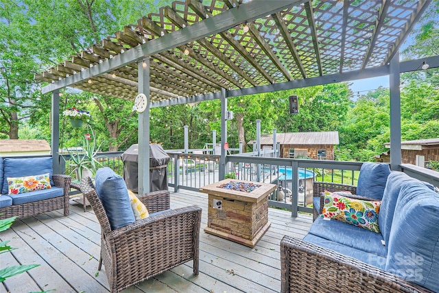 200 W 14th St, Salisbury, NC 28144 - wooden terrace featuring a fire pit, a grill, a pergola, and view of wooded area