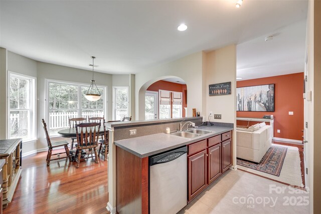 288 Sand Paver Way Unit 50, Fort Mill, SC 29708 - kitchen with stainless steel dishwasher, a sink, arched walkways, pendant lighting, and recessed lighting
