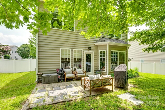 288 Sand Paver Way Unit 50, Fort Mill, SC 29708 - back of house featuring a patio area, an outdoor living space, and a shingled roof