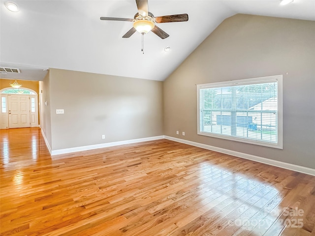 1625 Damascus Cir, Conover, NC 28613 - spare room featuring healthy amount of natural light, lofted ceiling, a ceiling fan, light wood-style flooring, and baseboards