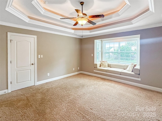 1625 Damascus Cir, Conover, NC 28613 - unfurnished room featuring a raised ceiling, ornamental molding, ceiling fan, carpet flooring, and baseboards