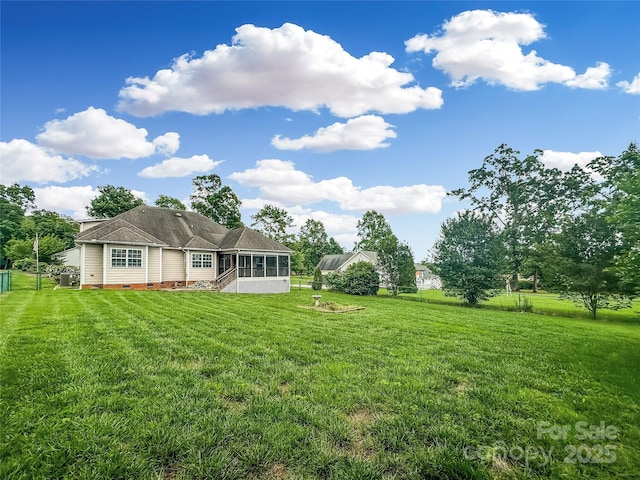 1625 Damascus Cir, Conover, NC 28613 - back of house with a sunroom, a yard, and crawl space