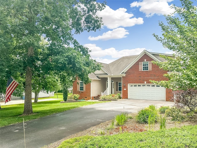 1625 Damascus Cir, Conover, NC 28613 - view of front of property featuring concrete driveway, brick siding, an attached garage, and a front yard