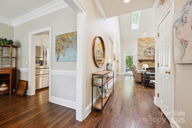 8109 Hawk Crest Ct, Charlotte, NC 28270 - hall with dark wood-style floors, ornamental molding, and a skylight