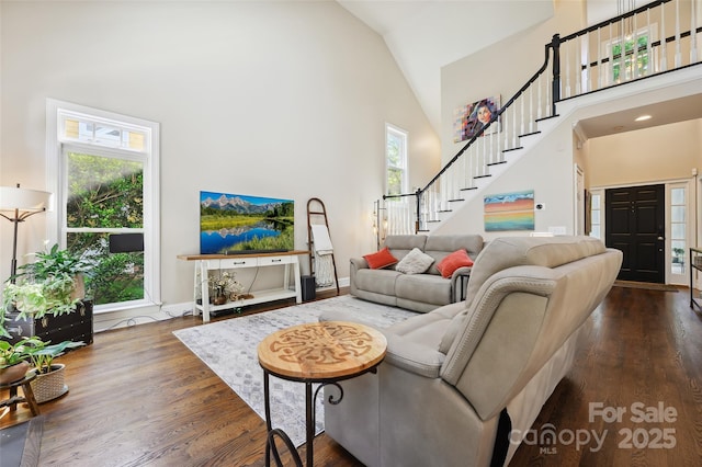 8109 Hawk Crest Ct, Charlotte, NC 28270 - living area featuring stairway, high vaulted ceiling, and dark wood finished floors