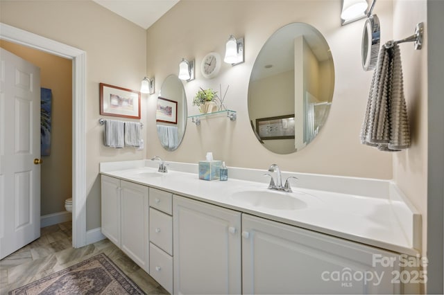 8109 Hawk Crest Ct, Charlotte, NC 28270 - bathroom featuring double vanity and toilet