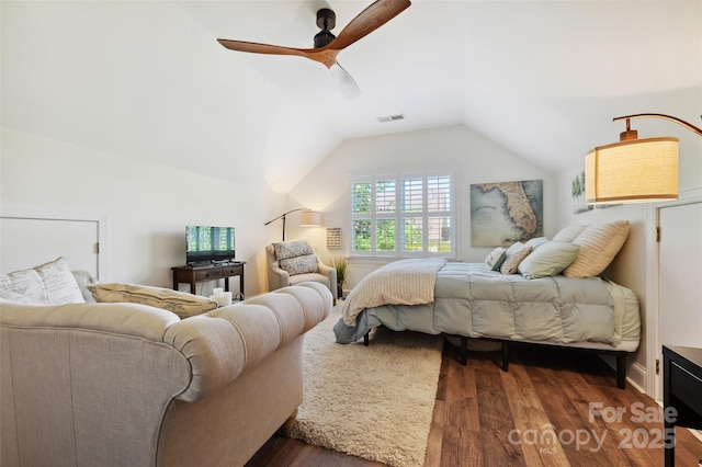 8109 Hawk Crest Ct, Charlotte, NC 28270 - bedroom featuring vaulted ceiling, dark wood-style flooring, and a ceiling fan