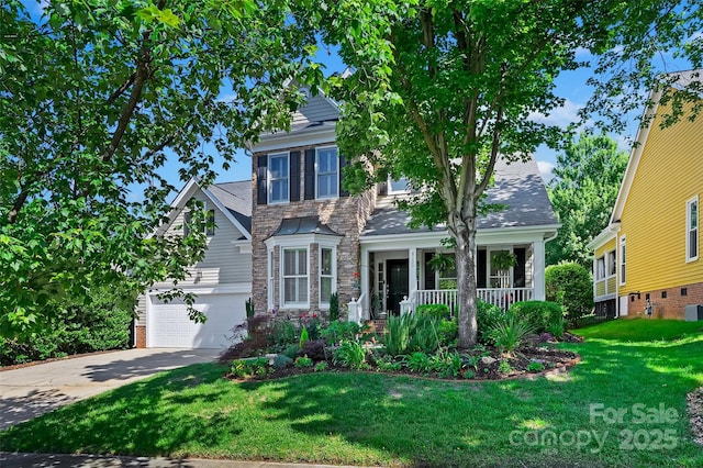 8109 Hawk Crest Ct, Charlotte, NC 28270 - traditional-style house with stone siding, driveway, a front yard, and a porch