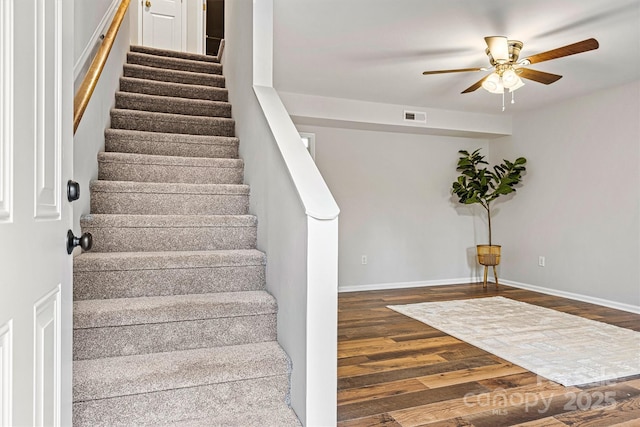 729 Tenth Ave NE, Hickory, NC 28601 - stairway featuring ceiling fan, wood finished floors, and baseboards