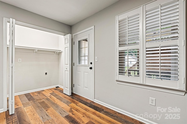 729 Tenth Ave NE, Hickory, NC 28601 - washroom featuring hookup for an electric dryer, wood finished floors, and baseboards