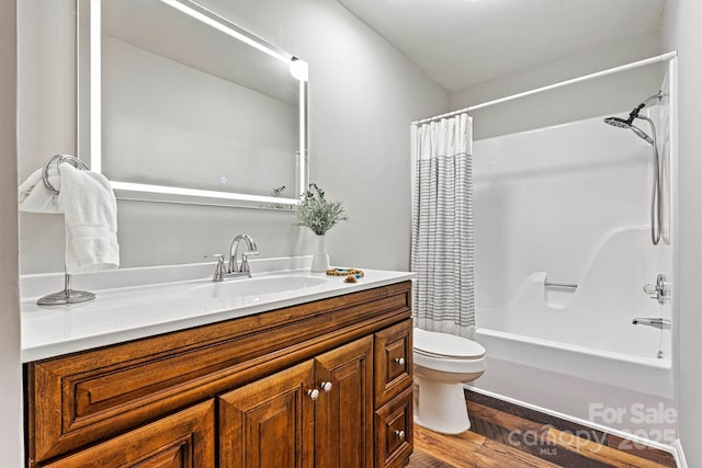 729 Tenth Ave NE, Hickory, NC 28601 - full bath with vanity, wood finished floors, shower / tub combo with curtain, and toilet