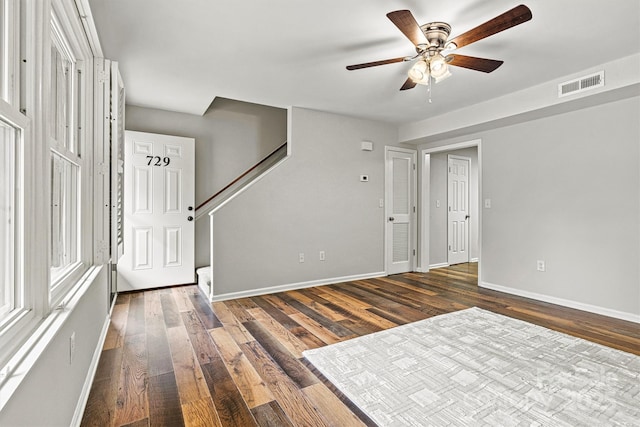 729 Tenth Ave NE, Hickory, NC 28601 - foyer with a ceiling fan, baseboards, dark wood finished floors, and stairs
