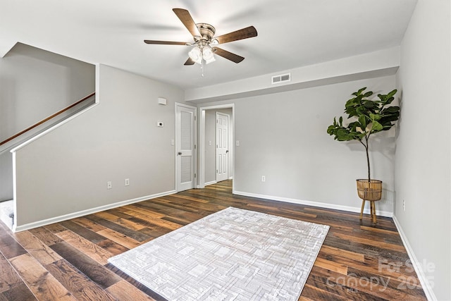 729 Tenth Ave NE, Hickory, NC 28601 - unfurnished room with a ceiling fan, wood finished floors, and baseboards