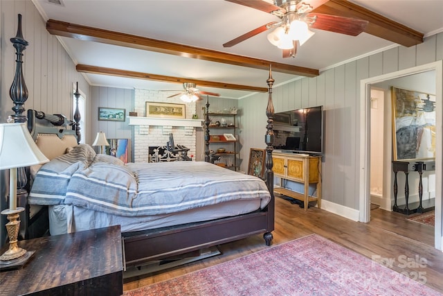 1645 Brookdale Ave, Charlotte, NC 28210 - bedroom featuring beam ceiling, wood finished floors, and crown molding