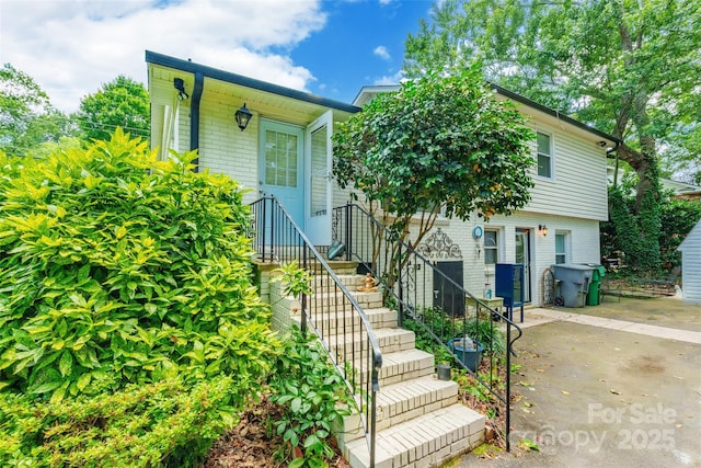 1645 Brookdale Ave, Charlotte, NC 28210 - view of front of home with brick siding and a patio