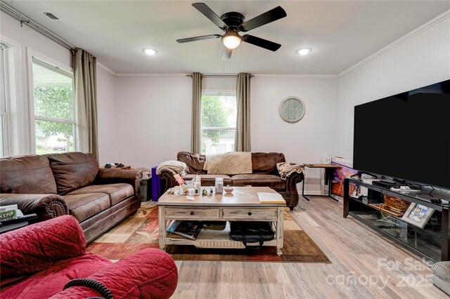 812 Kings Rd, Shelby, NC 28150 - living area with light wood-style flooring, healthy amount of natural light, crown molding, ceiling fan, and recessed lighting