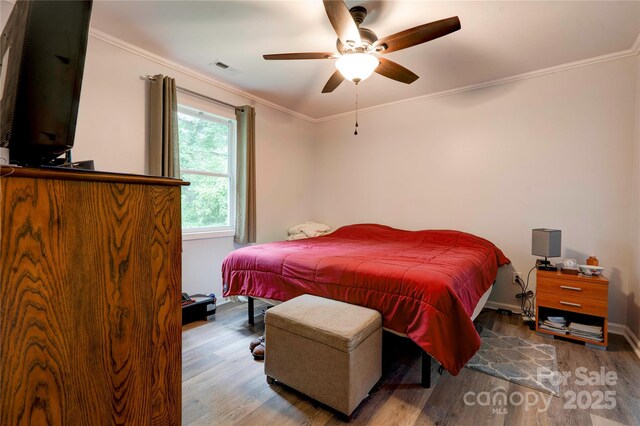 812 Kings Rd, Shelby, NC 28150 - bedroom featuring wood finished floors, ornamental molding, and ceiling fan