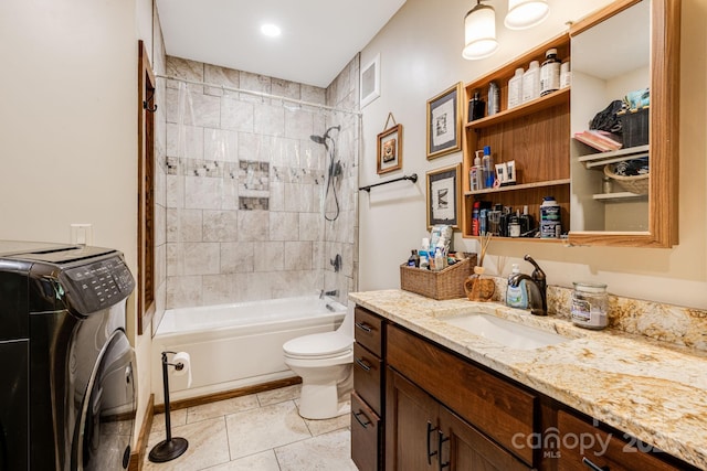 43 Dillingham Estates Trl, Swannanoa, NC 28778 - full bathroom featuring vanity, toilet, washer / dryer, shower / bathtub combination, and tile patterned flooring