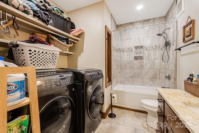 43 Dillingham Estates Trl, Swannanoa, NC 28778 - laundry area with separate washer and dryer, light tile patterned floors, recessed lighting, and baseboards