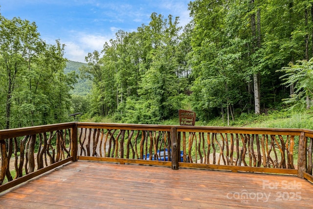 43 Dillingham Estates Trl, Swannanoa, NC 28778 - wooden terrace featuring a view of trees