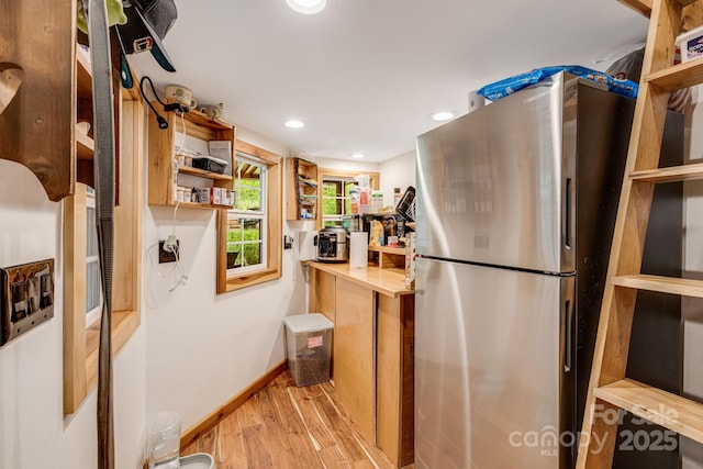 43 Dillingham Estates Trl, Swannanoa, NC 28778 - kitchen featuring open shelves, freestanding refrigerator, light wood-style floors, baseboards, and recessed lighting