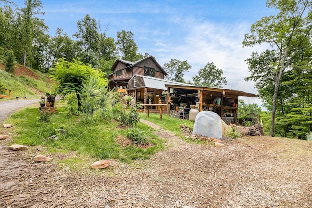 43 Dillingham Estates Trl, Swannanoa, NC 28778 - view of front facade featuring an exterior structure and an outdoor structure