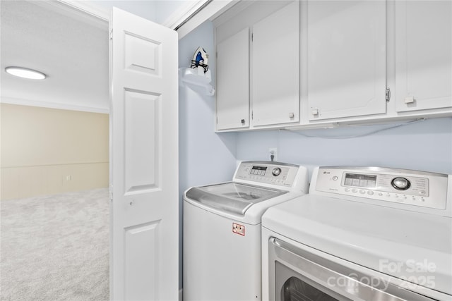 7528 Red Oak Ln, Charlotte, NC 28226 - washroom with cabinet space, washing machine and dryer, and carpet flooring