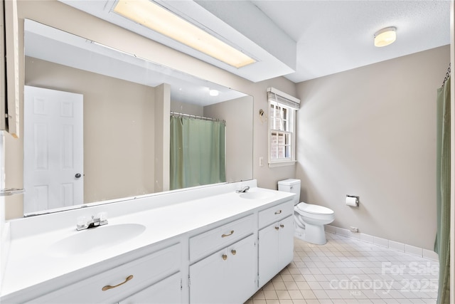 7528 Red Oak Ln, Charlotte, NC 28226 - bathroom with double vanity, tile patterned floors, and curtained shower