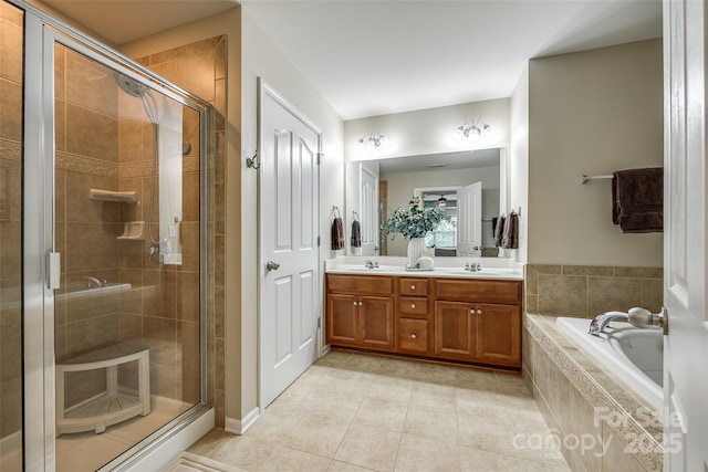 714 Deerbrook Ln, Tega Cay, SC 29708 - bathroom with double vanity, a shower stall, a garden tub, and tile patterned flooring
