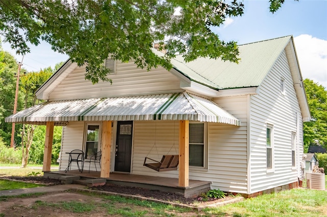 505 S Eastway Dr, Troutman, NC 28166 - view of front of house with covered porch and a metal roof