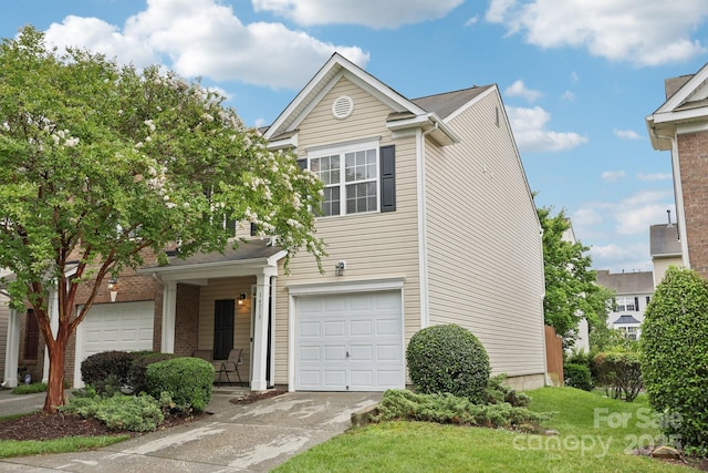14018 Drake Watch Ln, Charlotte, NC 28262 - view of front of property with concrete driveway and a garage