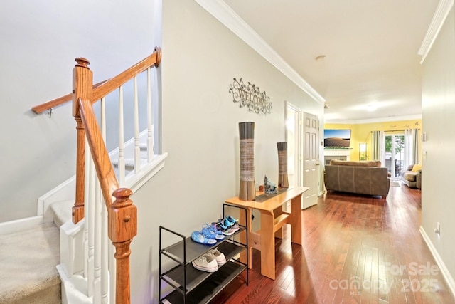 14018 Drake Watch Ln, Charlotte, NC 28262 - corridor with stairway, ornamental molding, wood-type flooring, and baseboards